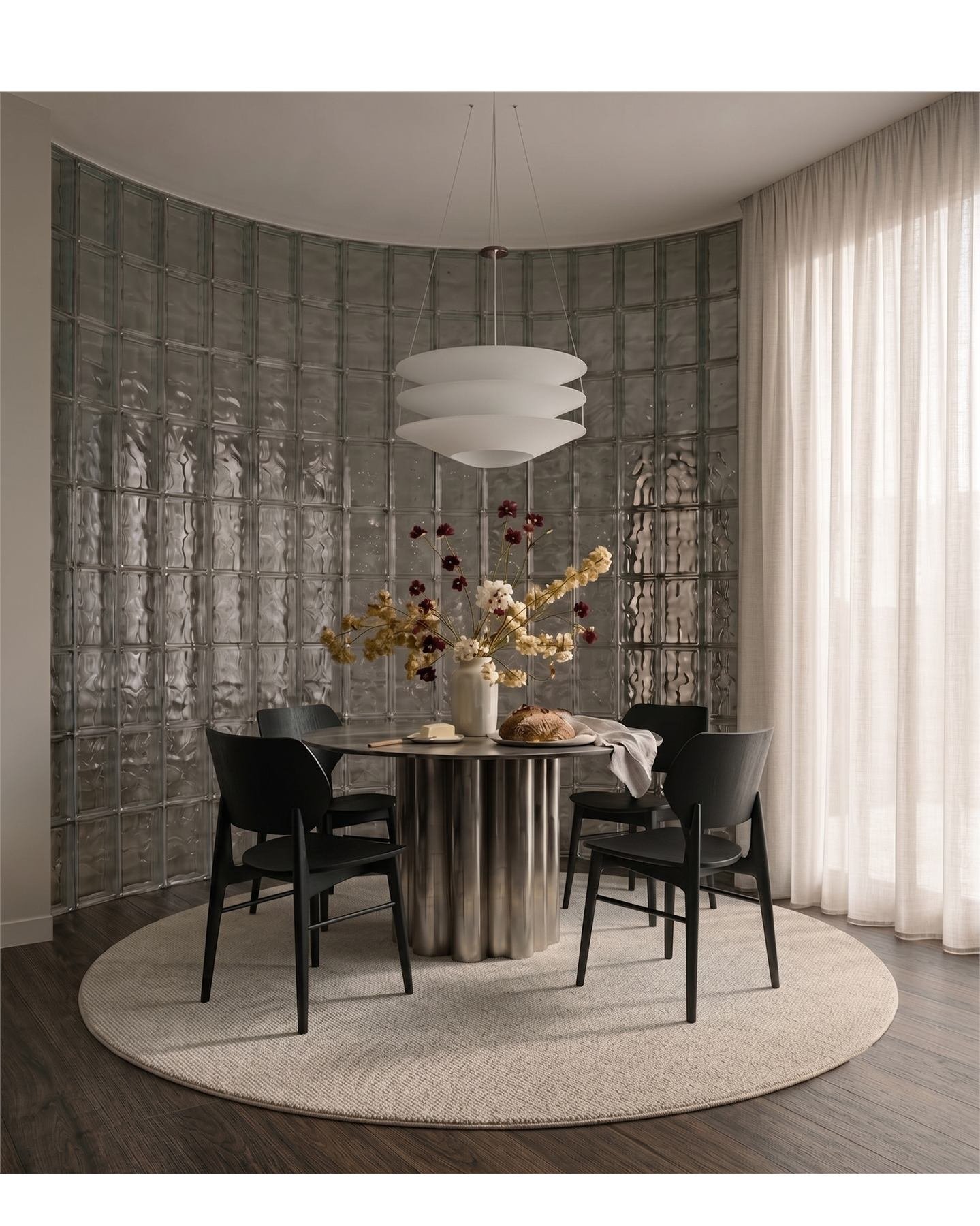 Curved dining corner with glass block wall and soft daylight