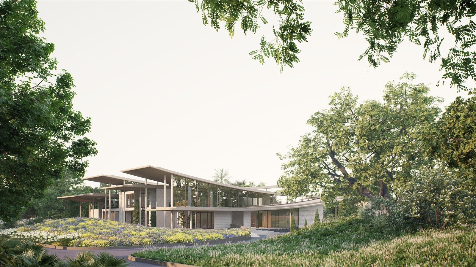 Farmhouse exterior with long horizontal roofline and planted approach